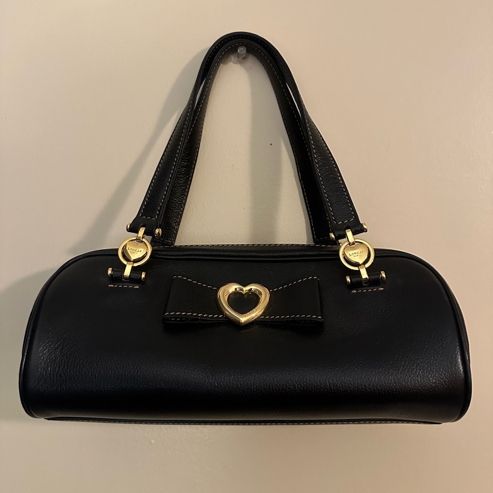 Black and gold handbag with heart details